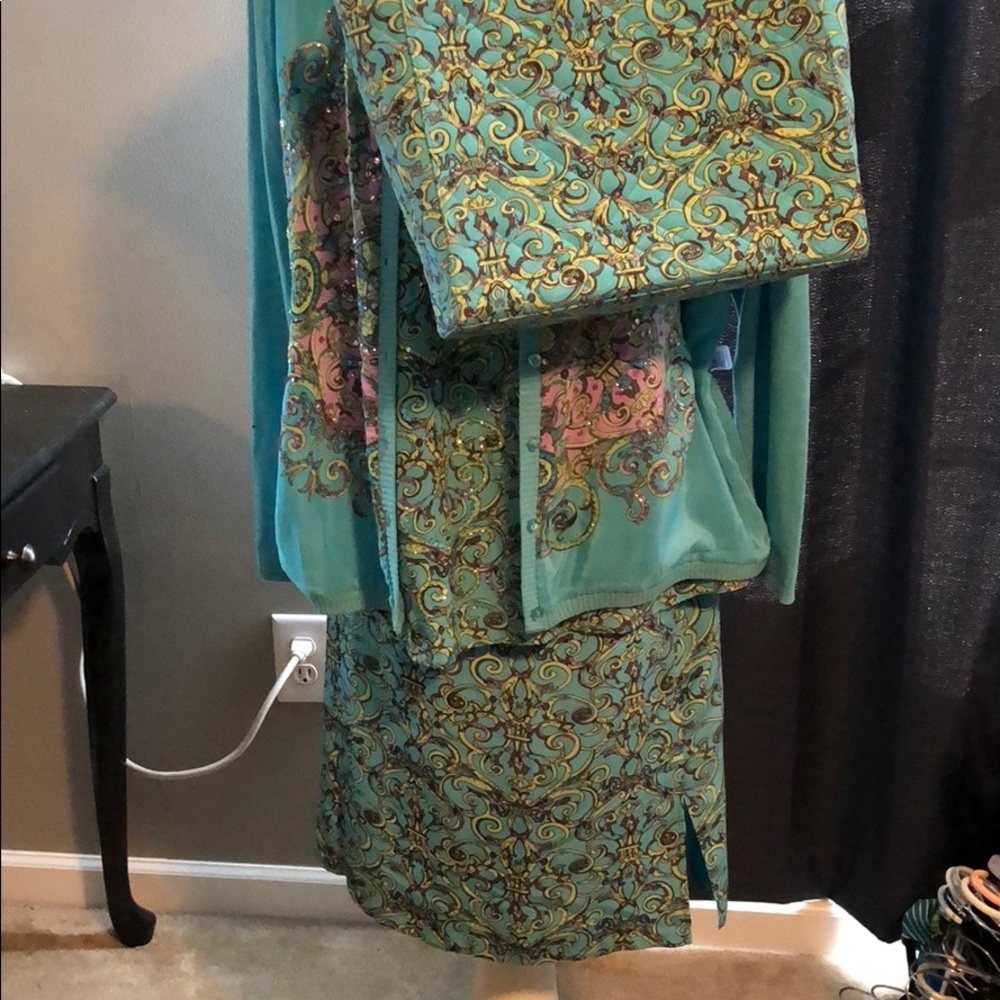 4 piece suit with matching pocket book